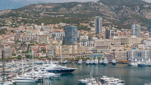 Monte Carlo city aerial panorama timelapse. View of luxury yachts and apartments in harbor of Monaco, Cote d'Azur. photo