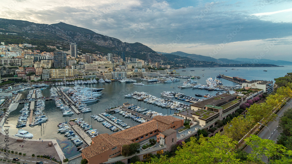 Obraz premium Panorama of Monte Carlo day to night timelapse from the observation deck in the village of Monaco with Port Hercules