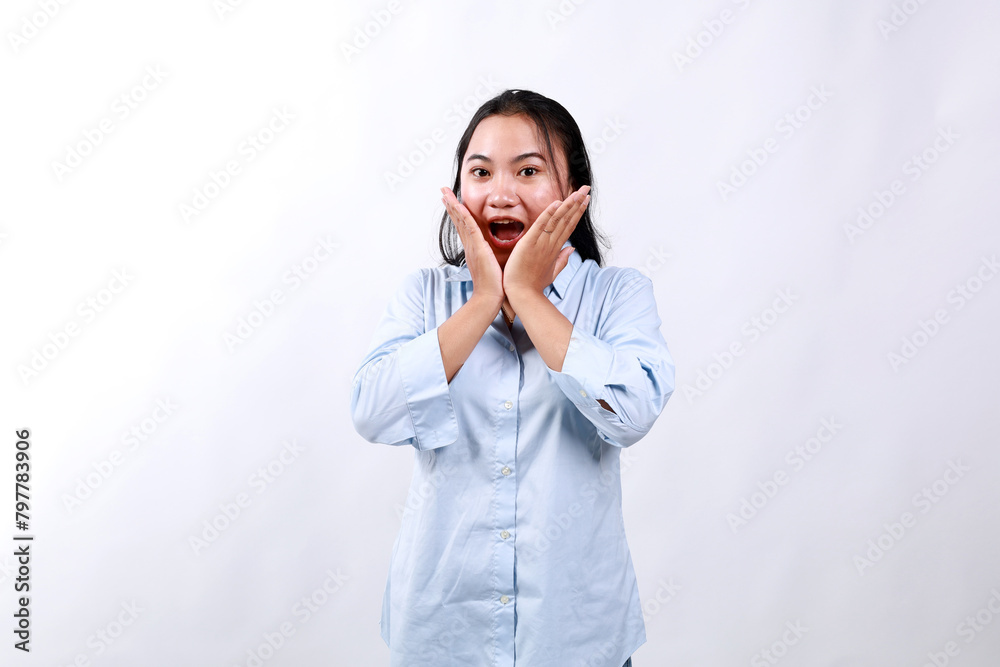 Young cheerful asian woman look with surprised face at camera, react to awesome good news, smiling and cheering, standing against white background Young cheerful asian woman look with surprised face at camera, react to awesome good news, smiling and cheering, standing against white background