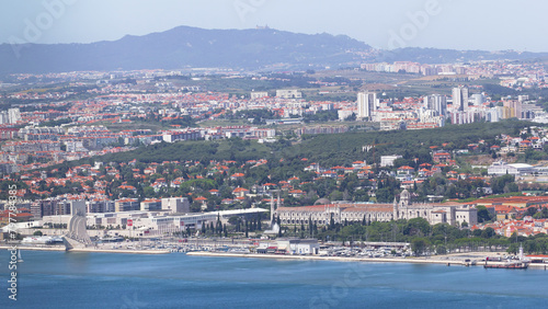Fototapeta Naklejka Na Ścianę i Meble -  Panoramic view of Lisbon skyline, docks and the Tagus River, Lisbon, Portugal timelapse