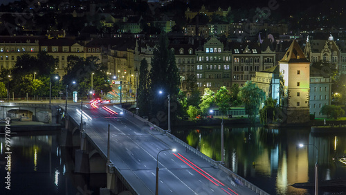 Jirasek Bridge on the Vltava river night timelapse in Prague, Czech Republic photo