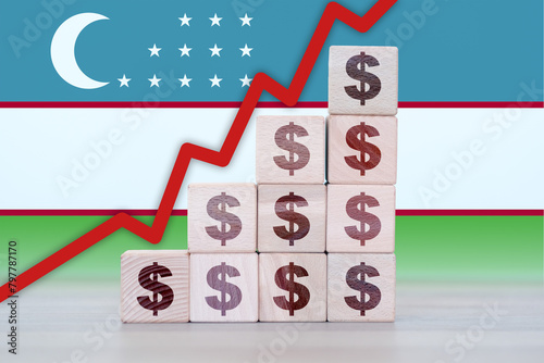 Uzbekistan economic collapse, increasing values with cubes, financial decline, crisis and downgrade concept