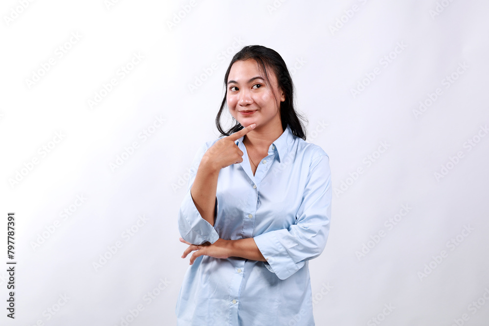 Joyful confident asian girl dreaming, imaging interesting plan, smiling cunning, have idea, thinking and making choice, look up thoughtful, stand white background