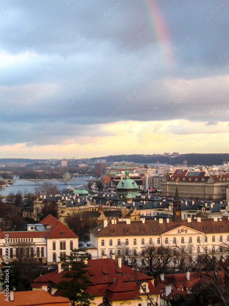 A rainbow at dusk over the palaces of the little quarter of Prague, known as the Malá Strana