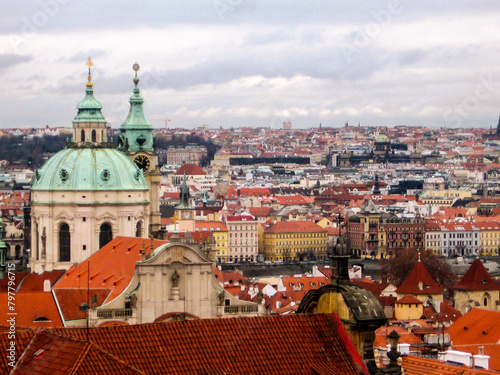 Rooftops of the Malá Strana, also known as the Lesser town of Prague, Czech Republic, with the baroque dome of the church of St Nicolas in the foreground