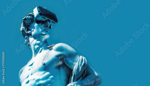 Greek statue wearing virtual reality glasses on a blue background photo