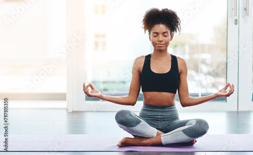 Peace, yoga and home with woman, meditation and exercise with wellness, summer and fitness. Body care, lotus pose and girl with peace, sunshine and breathing with progress, zen and health with smile