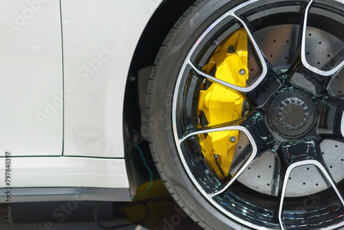 Alloy wheel with calipers and racing brakes of the sport car.
