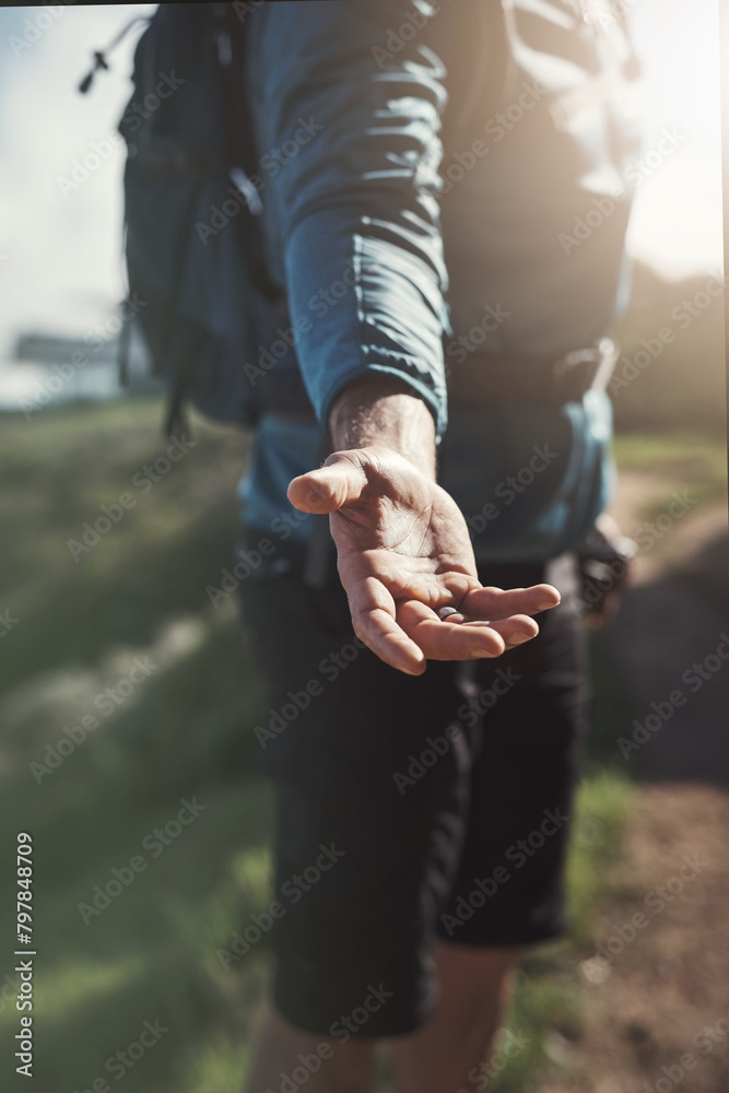 Hiking, help and fitness man with hand offer in nature pov for teamwork, support or forest exercise collaboration. Trust, challenge or hiker with reaching palm for adventure, come or guide invitation