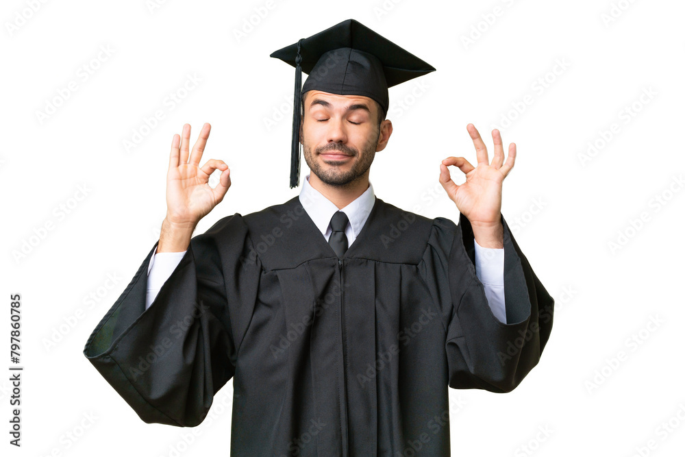 Young university graduate man over isolated background in zen pose Young university graduate man over isolated background in zen pose