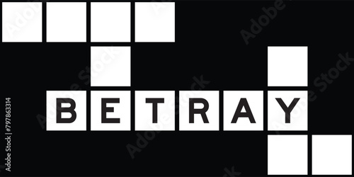 Alphabet letter in word betray on crossword puzzle background
