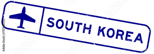 Grunge blue south korea word with plane icon square rubber seal stamp on white background