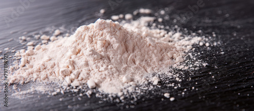 Heroin powder on dark surface
