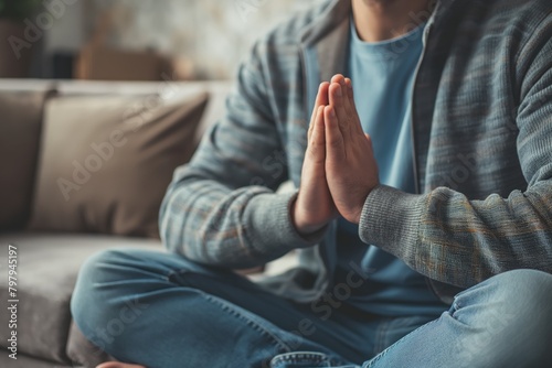 Man meditating in a peaceful home setting photo