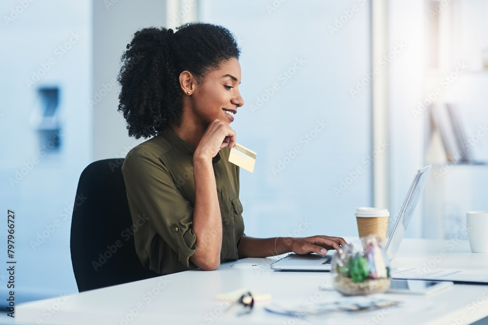 Happy woman, business and laptop with credit card for online shopping, payment or purchase at office. Female person, shopper or employee with debit for banking or transaction on computer at workplace Happy woman, business and laptop with credit card for online shopping, payment or purchase at office. Female person, shopper or employee with debit for banking or transaction on computer at workplace