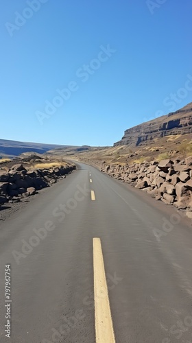 b Paved road through a canyon 