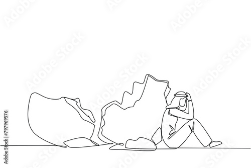 Continuous one line drawing Arabian businessman sit slump next to a large, destroyed big piggy bank. Lament the fate. No capital at all. No savings left. Single line draw design vector illustration