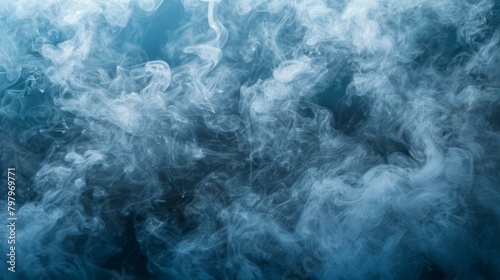 b'Blue smoke swirls against a dark blue background'