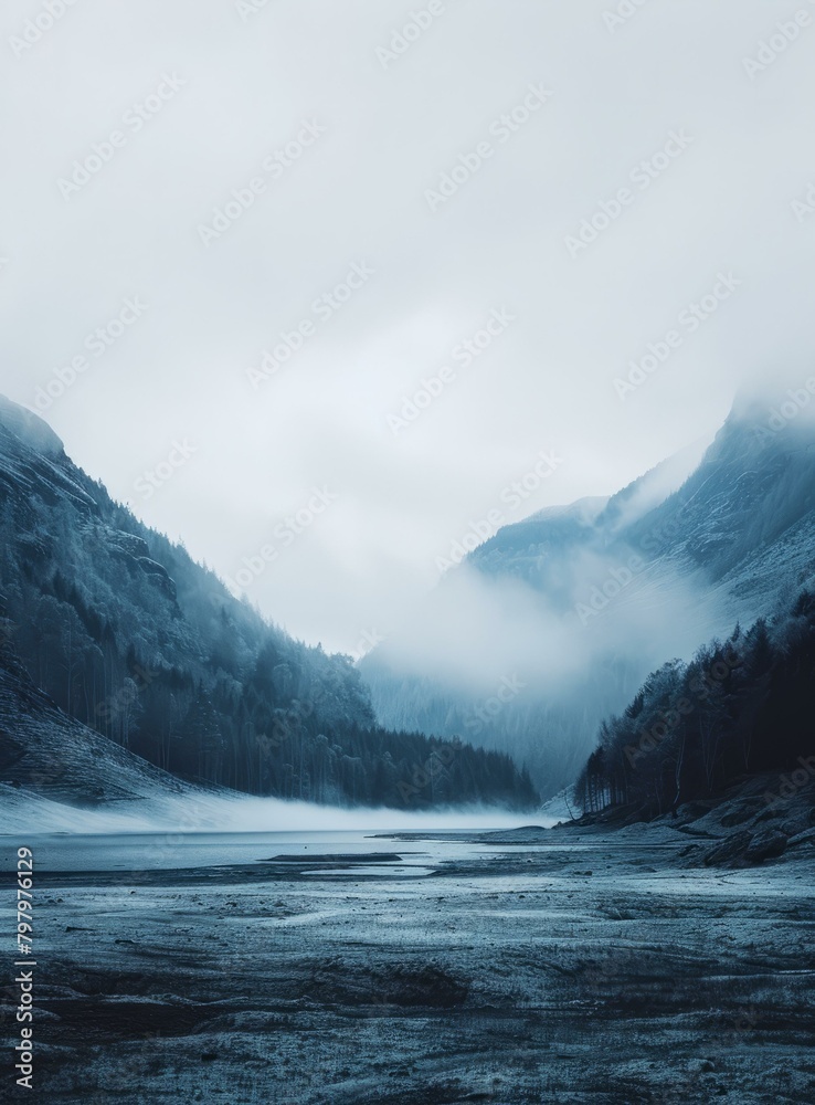 b'Foggy mountains and lake landscape' b'Foggy mountains and lake landscape'