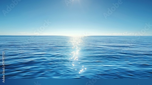 b'Blue ocean with sun reflecting off the surface'