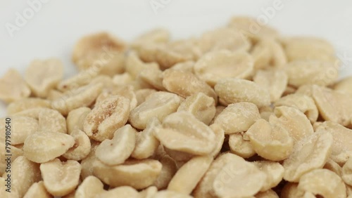 Close-Up of Salted Peanuts on White