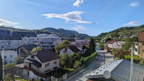 Cityscape surrounded by green hills and forest under blue sky, Krapina city, Croatia, Hrvatsko zagorje, background, wallpaper