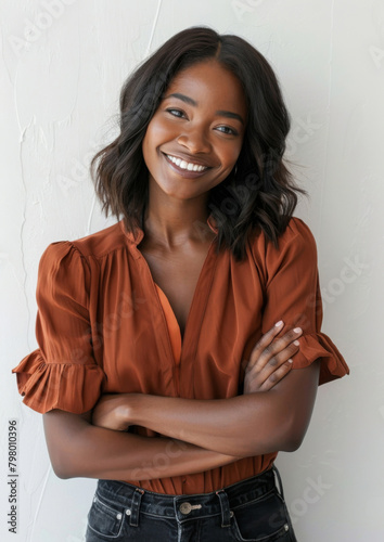 Black woman, portrait and creative or happy in studio, entrepreneur and startup employee for design agency. Confident, businesswoman on white background, smile and mockup with African professional