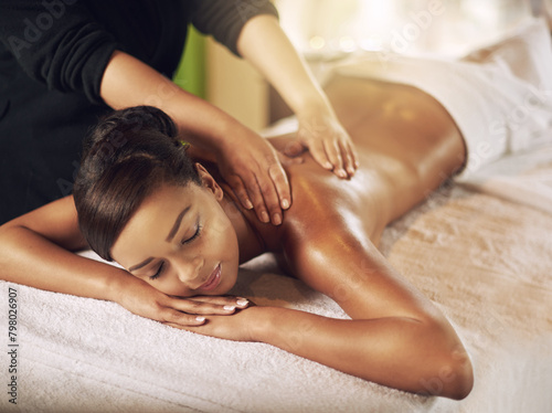 Massage, woman and wellness in spa for relax, recovery and peace on vacation or weekend. Body care, wellbeing and holistic healing in beauty salon with professional masseuse, zen and detox on holiday
