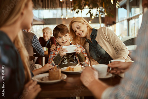 Family enjoying time together at a cafe photo
