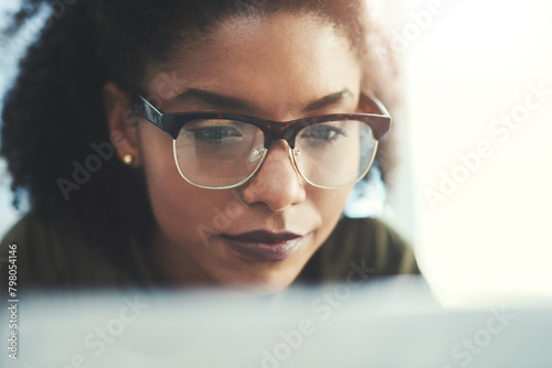 Business woman, laptop and glasses with online research, internet and content creation for website. Ux developer, planning and tech with startup employee and digital job of professional with working