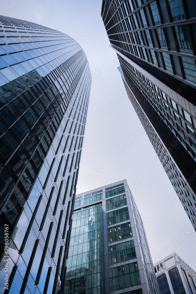Low-angle shot of business buildings in downtown Vancouver. 