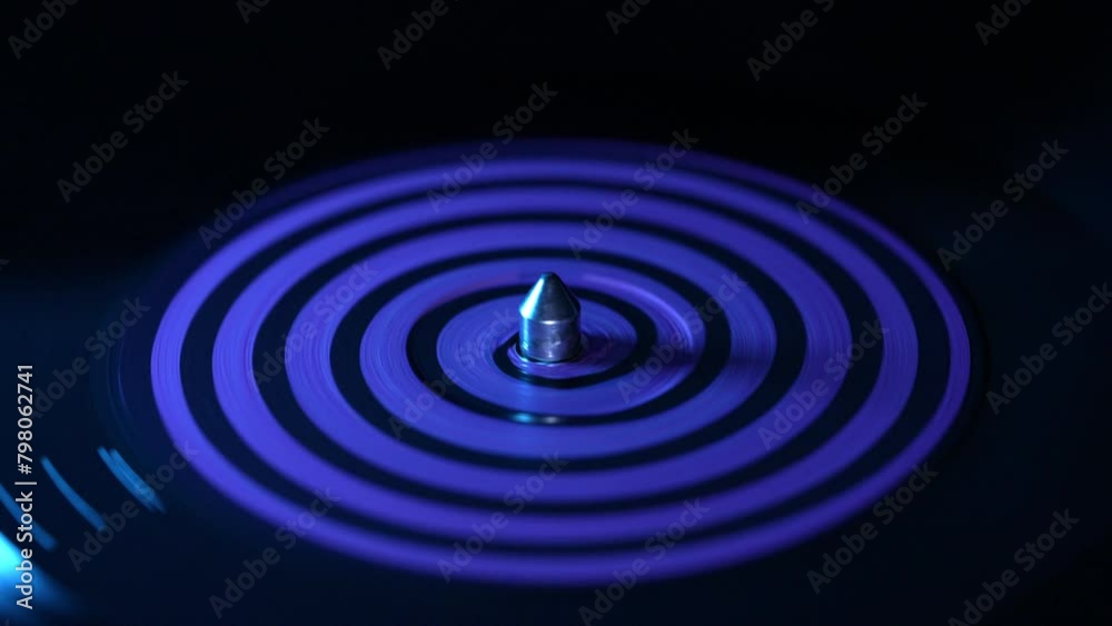 Spinning Vinyl Record Grooves, Playing Music. Plate Needle Stylus, Loop Song Video. Spiral blue apple. Spinning Vinyl Record Grooves, Playing Music. Plate Needle Stylus, Loop Song Video. Spiral blue apple.