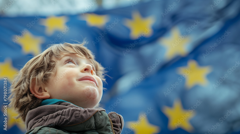 Young kid in front of the european flag Young kid in front of the european flag