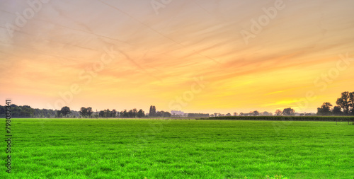 Sunset over the rural meadows of Noord-Brabant, The Netherlands. photo