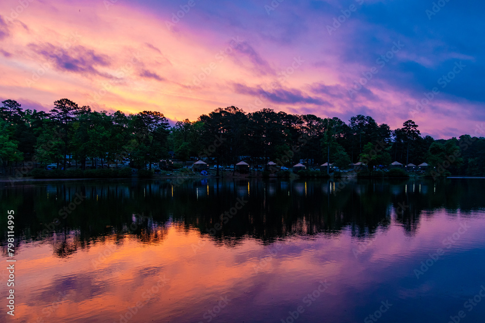 colorful sunrise over lake and RV camp ground in Stone Mountain Park Atlanta colorful sunrise over lake and RV camp ground in Stone Mountain Park Atlanta