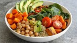 Avocado, quinoa, sweet potato, tomato, spinach and chickpeas vegetables salad