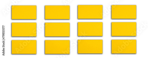 Mockup of horizontal gold business cards stacks arranged in rows at white background. Banner.