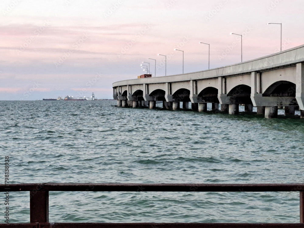 Progreso is a Mexican port city on the Yucatan Peninsula with its iconic arched pier and famous boardwalk