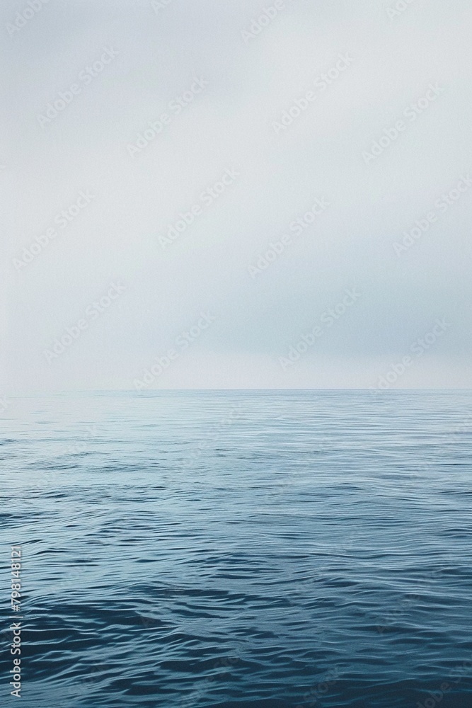 Where Ocean Meets Sky: A Tapestry of Gray and Blue