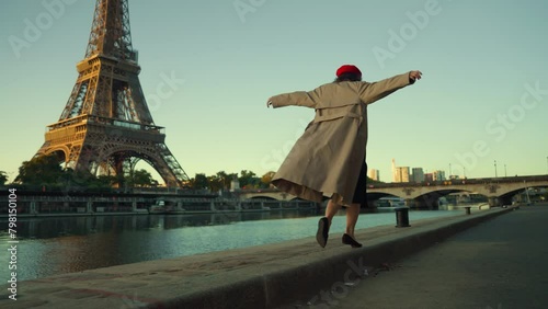 Woman Balancing near Eiffel Tower (ID: 798150104)