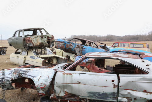 old rusty cars at an autowrecker