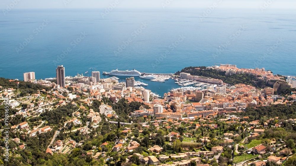 Obraz premium Harbour Town, City with Skyscrapers, Touristic Downtown with Yachts, Ocean view fro the city 