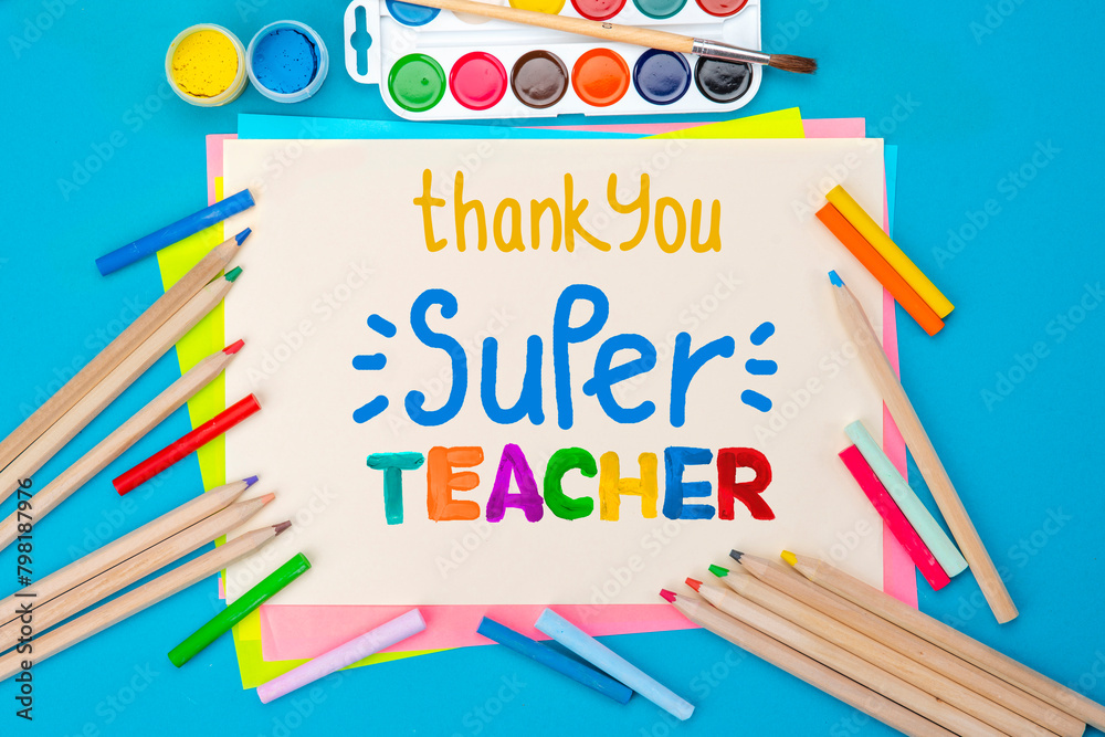 Childish lettering for Teachers' Day. Appreciation of teachers top view flat lay concept. Colored paper, multi-coloured letters, supplies Childish lettering for Teachers' Day. Appreciation of teachers top view flat lay concept. Colored paper, multi-coloured letters, supplies
