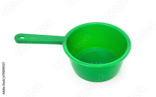Green pot with long handle.