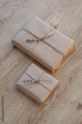 Packing books and boxes from kraft paper and twine. Lavender decoration.