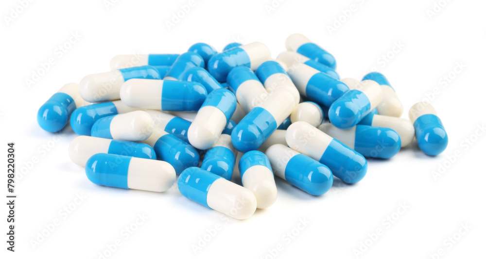 Pile of antibiotic pills isolated on white