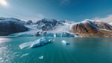 a backdrop of snow-capped peaks and icy fjords, the HD camera captures the pristine beauty of polar landscapes in captivating aerial photography, with glaciers and icebergs glistening in the sunlight