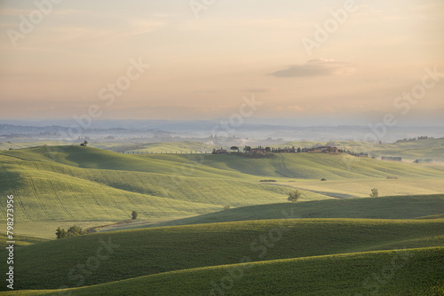 early morning with beautiful sunrise over the Val d Orcia  countryside in Tuscany.