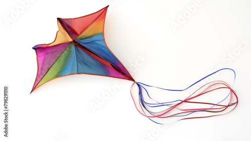 A colorful kite with a flowing tail on a white background. photo