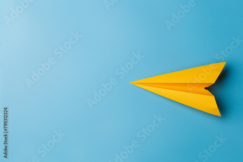 Yellow paper plane, copy space